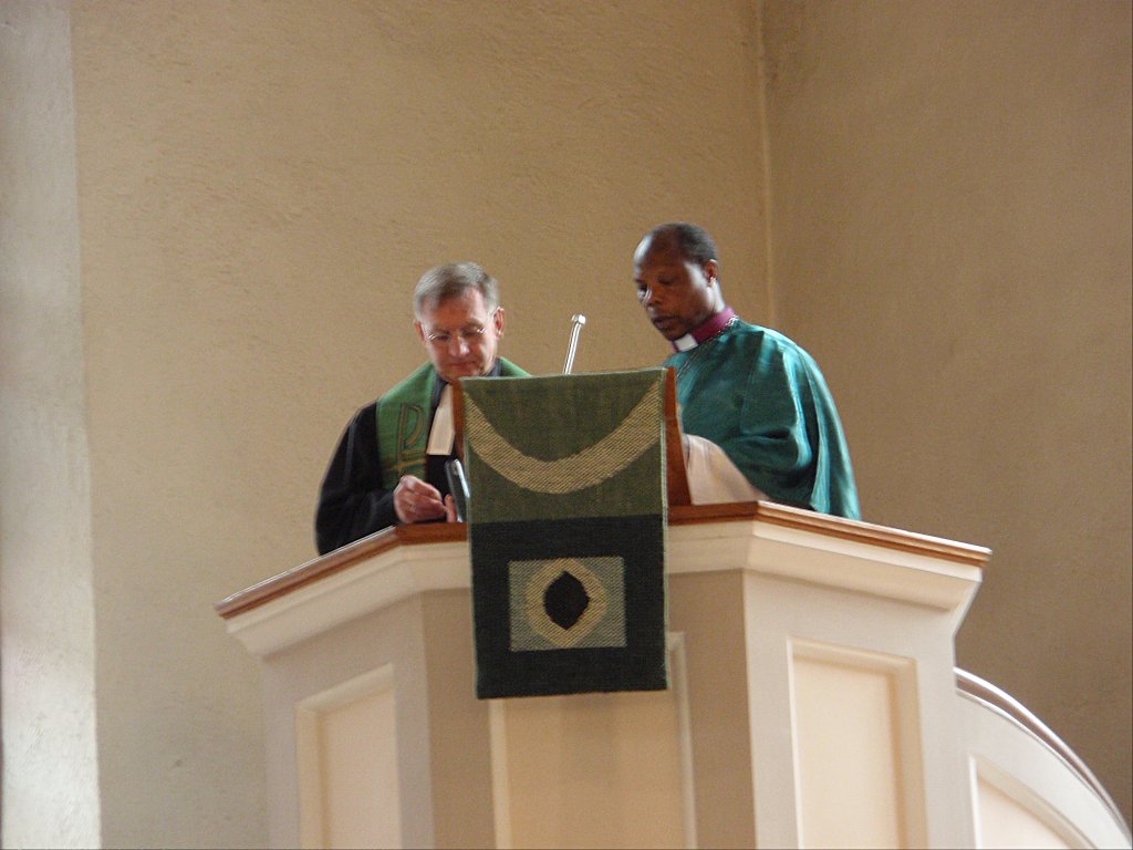 Bishop Kahuthu held the Swahili-language evening service in Freudenstadt town church (translated by Pastor Stierlen, left).